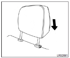 1. Align the head restraint stalks with the holes in the seat. Make sure the head restraint is facing the correct direction.