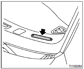 The vehicle identification number (VIN) plate is located as shown. This number is the identification for your vehicle and is used in the vehicle registration.