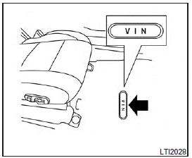 The vehicle identification number is located as shown.