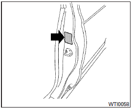 The cold tire pressure is shown on the Tire and Loading Information label. The label is located as shown.