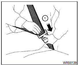 1 To unfasten the seat belt, press the button on the buckle. The seat belt automatically retracts.