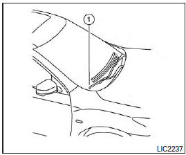 Be sure you do not put anything on top of the autolight sensor 1 located in the top side of the instrument panel. The autolight sensor controls the autolight; if it is covered, the autolight sensor reacts as if it is dark out and the headlights will illuminate.