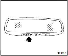 3. Using both hands, simultaneously push and hold both the HomeLink button you want to program and the hand-held transmitter button.