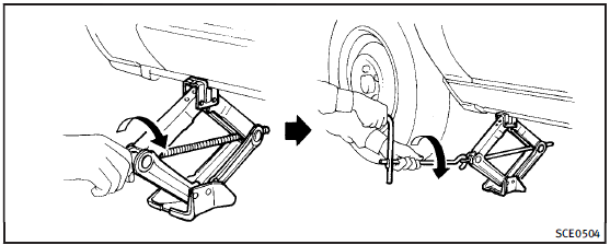 2. Loosen each wheel nut one or two turns by turning counterclockwise with the wheel nut wrench. Do not remove the wheel nuts until the tire is off the ground.